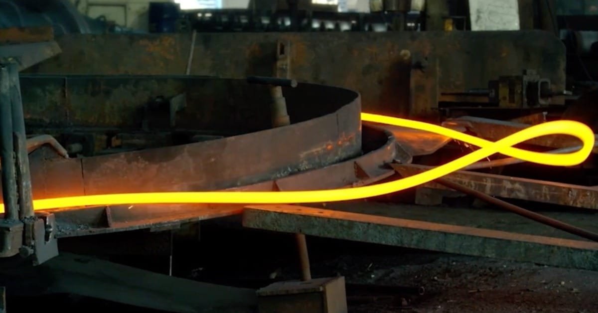 Hot steel bar passing through the rolling process
